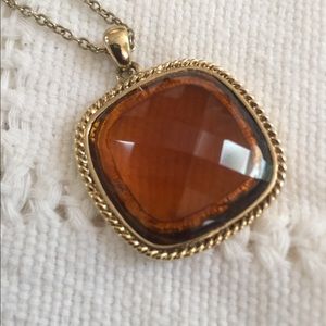 Gold tone cushion cut topaz costume pendant